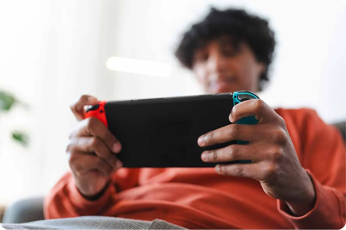 Someone Playing a Video Game while on high-speed Internet