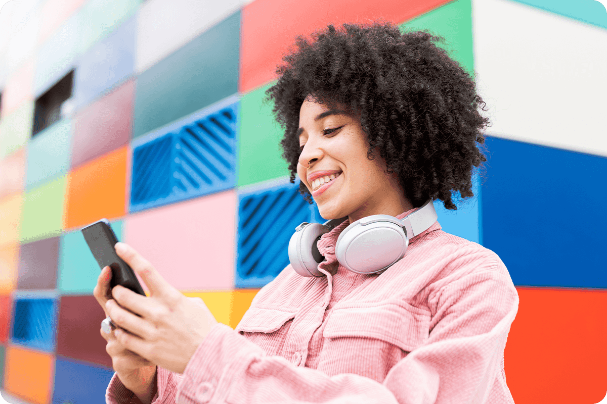 Woman using her Mobile phone on her Data Plan